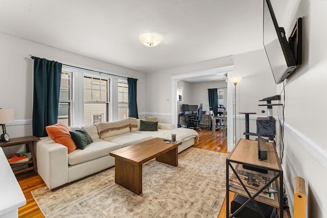 living room with light hardwood / wood-style flooring