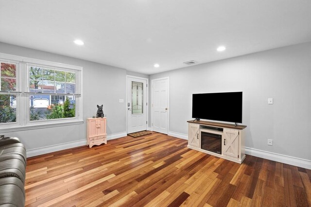 6 Birch Ln, Shrewsbury, MA 01545 - unfurnished living room featuring wood finished floors, recessed lighting, and baseboards