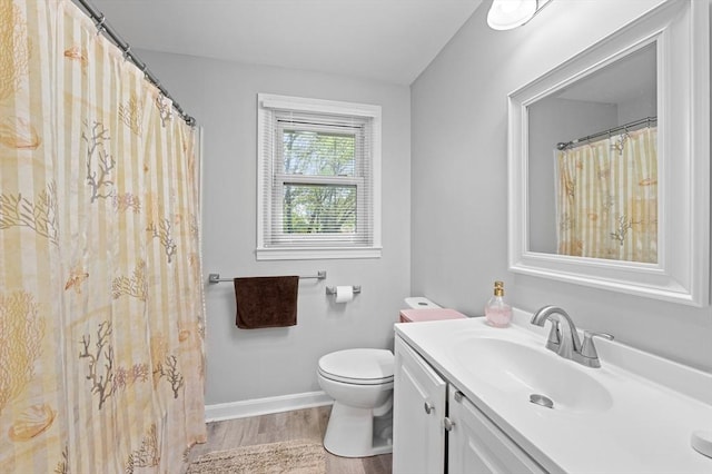 6 Birch Ln, Shrewsbury, MA 01545 - bathroom featuring wood finished floors, toilet, vanity, and baseboards