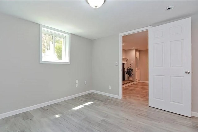 6 Birch Ln, Shrewsbury, MA 01545 - empty room with light wood-style floors and baseboards