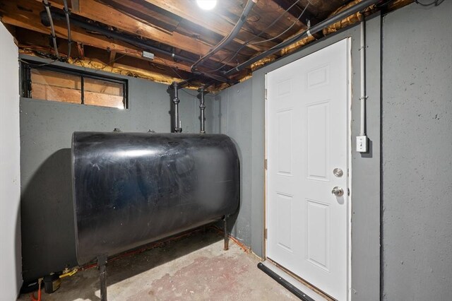 6 Birch Ln, Shrewsbury, MA 01545 - unfinished basement featuring oil tank