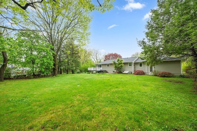 6 Birch Ln, Shrewsbury, MA 01545 - view of grassy yard with a wooden deck
