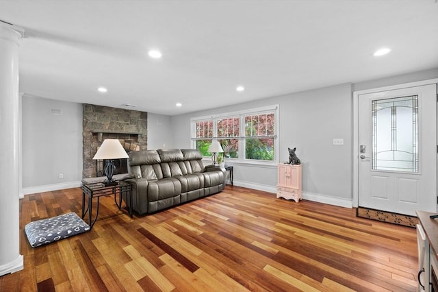 6 Birch Ln, Shrewsbury, MA 01545 - living area with light wood finished floors, baseboards, recessed lighting, and a fireplace
