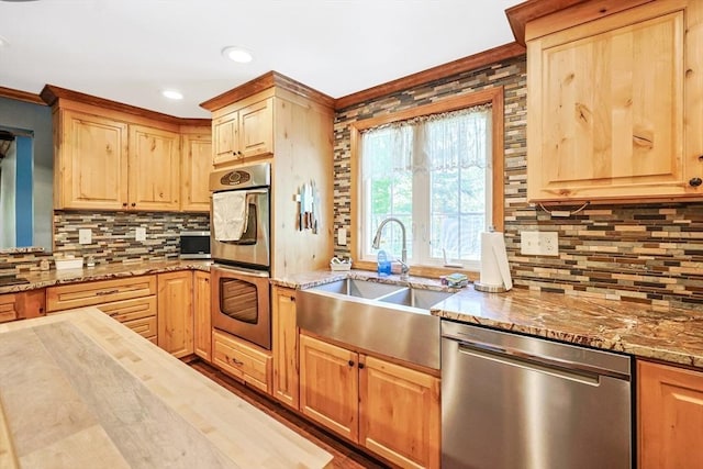 252 Howe St, East Brookfield, MA 01515 - kitchen with appliances with stainless steel finishes, a sink, backsplash, crown molding, and light brown cabinetry
