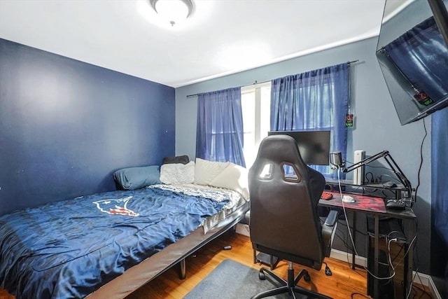 252 Howe St, East Brookfield, MA 01515 - bedroom with wood finished floors and an office area