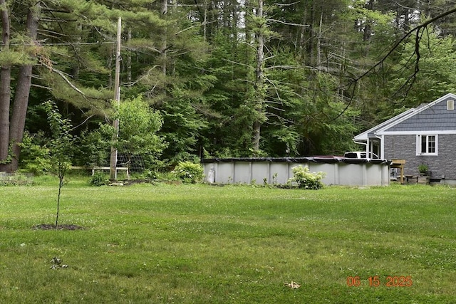 252 Howe St, East Brookfield, MA 01515 - view of green lawn featuring a covered pool