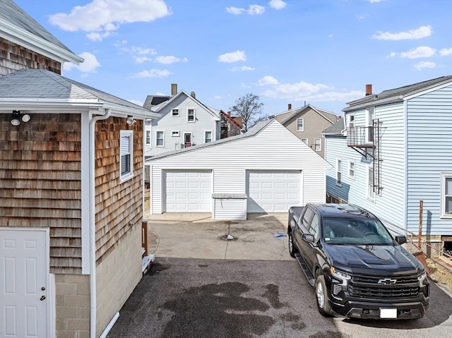 detached garage with a residential view