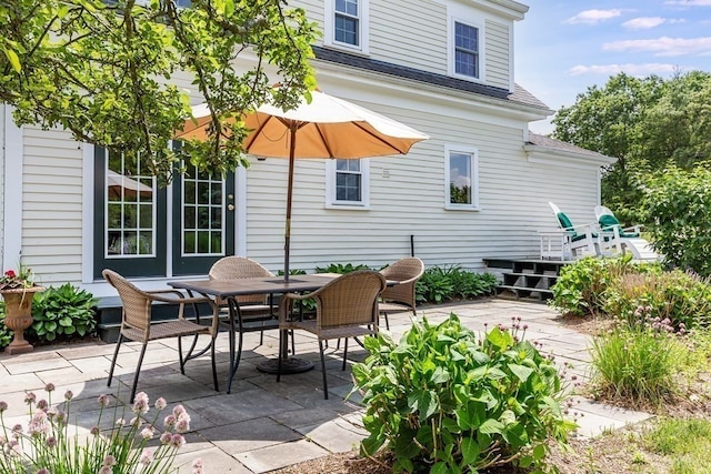 back of property with a patio area