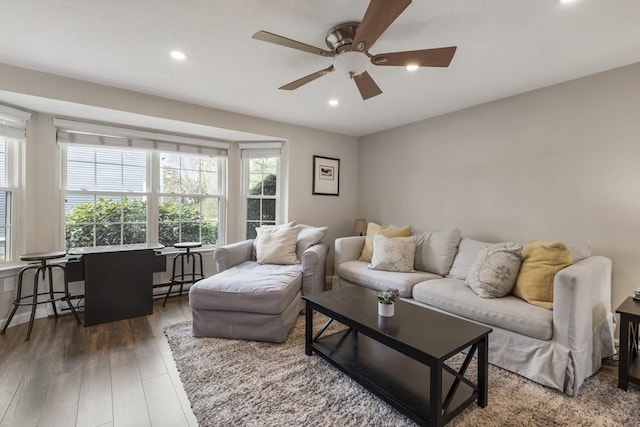 living room with recessed lighting, a ceiling fan, and wood finished floors