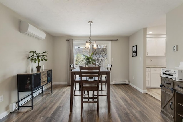 dining area featuring a baseboard radiator, a chandelier, dark wood-style flooring, baseboards, and a wall unit AC
