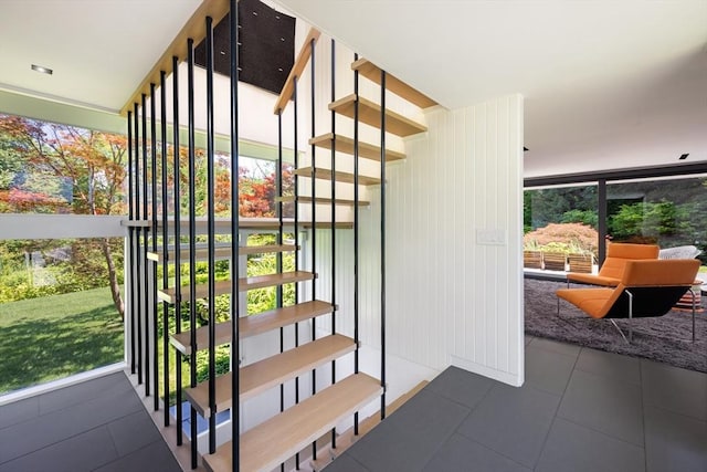 staircase featuring a wealth of natural light