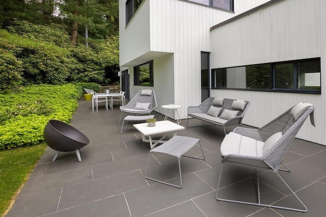 view of patio / terrace featuring outdoor dining area and an outdoor hangout area