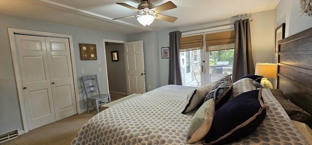 carpeted bedroom with access to exterior, ceiling fan, and a closet