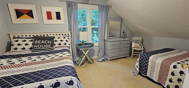 carpeted bedroom with lofted ceiling