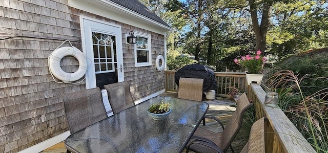 wooden deck with area for grilling