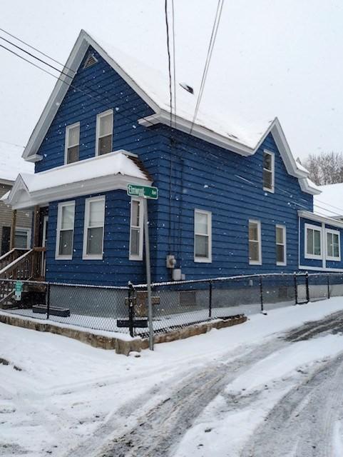 view of snow covered property