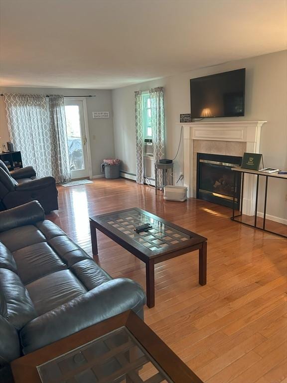 11 Solitaire Dr, Haverhill, MA 01830 - living room with wood finished floors and a fireplace
