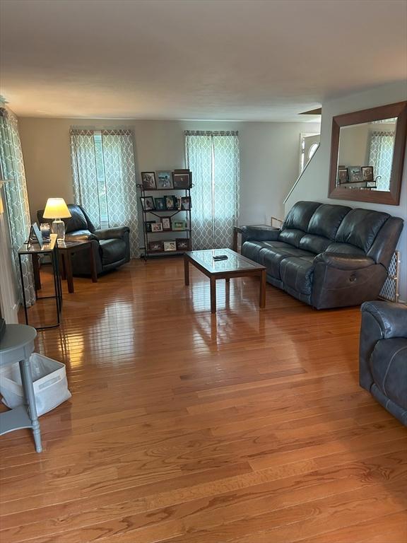 11 Solitaire Dr, Haverhill, MA 01830 - living room featuring light wood-type flooring and healthy amount of natural light
