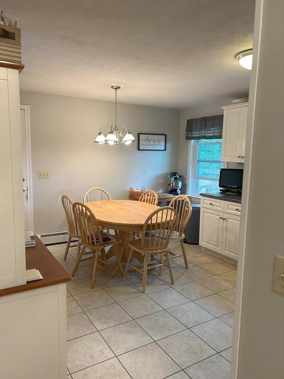 11 Solitaire Dr, Haverhill, MA 01830 - dining room featuring light tile patterned floors, a chandelier, and a baseboard heating unit