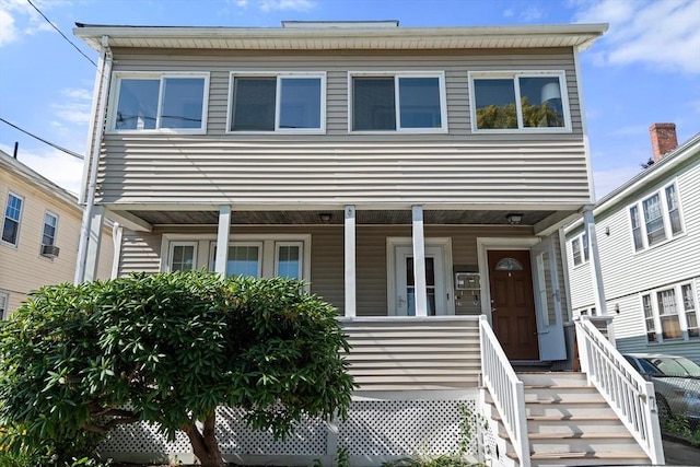 25-27 Morrow Rd, Boston, MA 02135 - view of property featuring covered porch