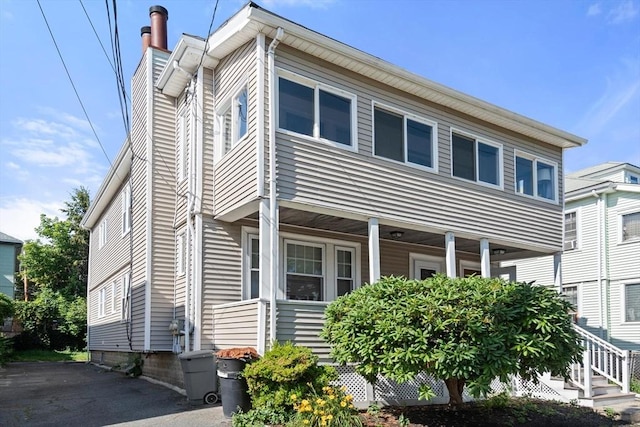 25-27 Morrow Rd, Boston, MA 02135 - view of front of home featuring covered porch