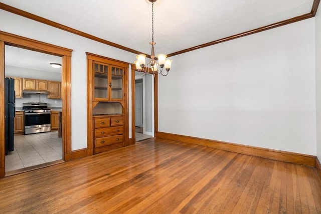25-27 Morrow Rd, Boston, MA 02135 - unfurnished room with light wood-style flooring, a chandelier, and ornamental molding