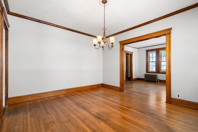 25-27 Morrow Rd, Boston, MA 02135 - spare room featuring radiator, hardwood / wood-style floors, a chandelier, and ornamental molding