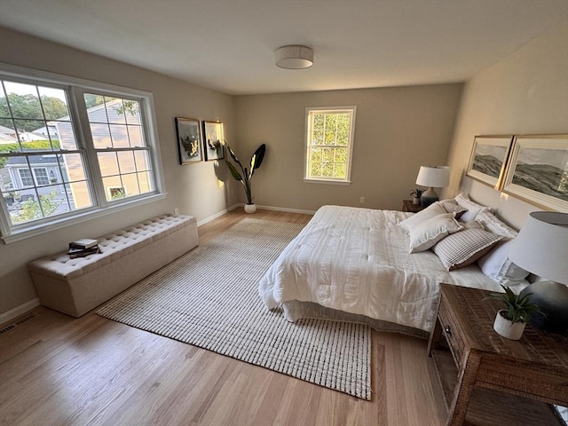 54 Vose St, Framingham, MA 01702 - bedroom featuring wood finished floors and baseboards