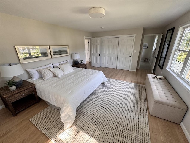 54 Vose St, Framingham, MA 01702 - bedroom with wood finished floors and a closet