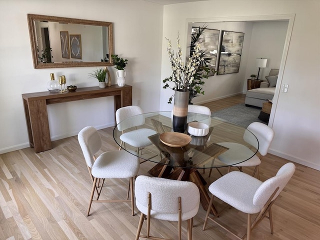 54 Vose St, Framingham, MA 01702 - dining space with wood finished floors and baseboards