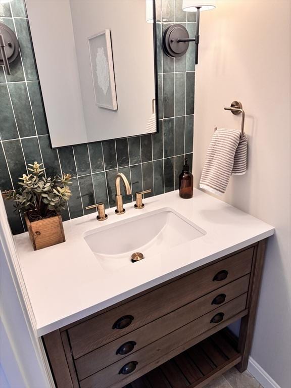 54 Vose St, Framingham, MA 01702 - bathroom featuring vanity and decorative backsplash