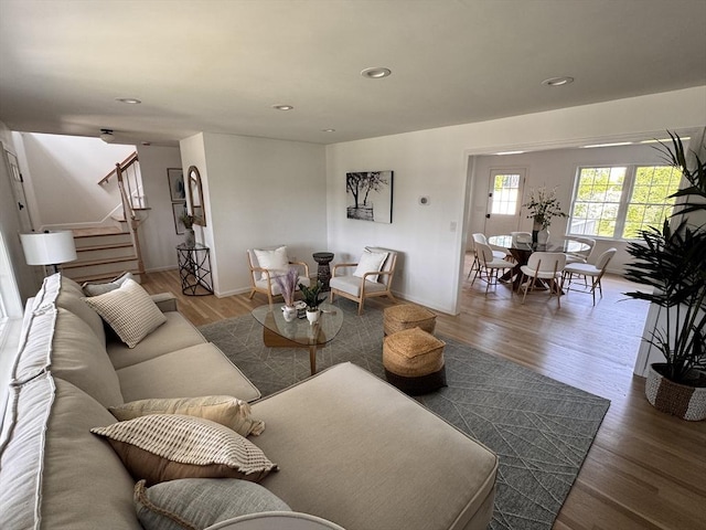54 Vose St, Framingham, MA 01702 - living area featuring stairway, wood finished floors, and recessed lighting