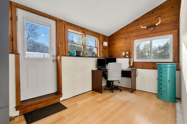 office featuring light hardwood / wood-style flooring and lofted ceiling