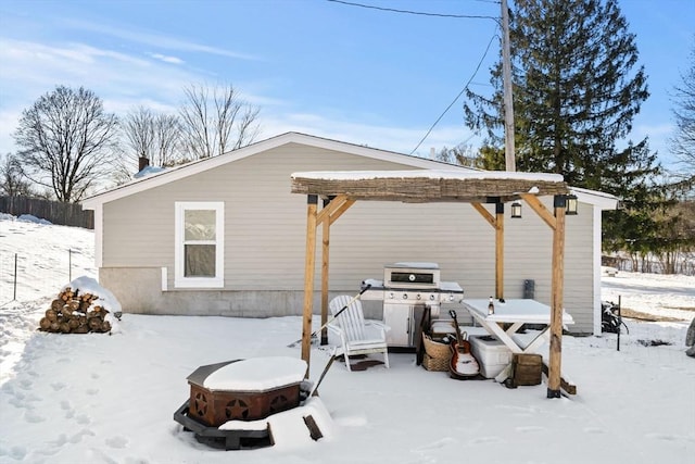 view of snow covered house