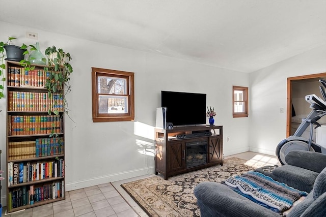 tiled living room with a wealth of natural light