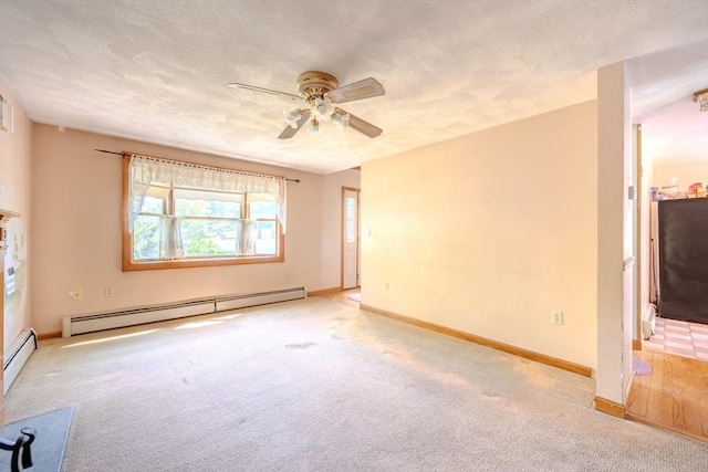 12 Jensen Ave, Chelmsford, MA 01824 - unfurnished room with ceiling fan, light carpet, baseboard heating, a textured ceiling, and baseboards
