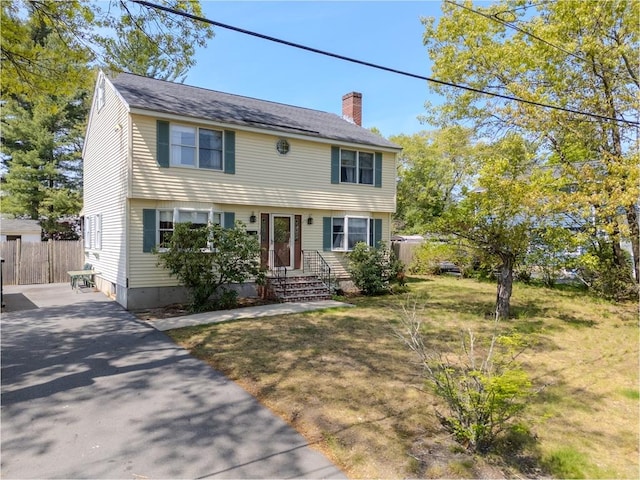 12 Jensen Ave, Chelmsford, MA 01824 - colonial house featuring a chimney