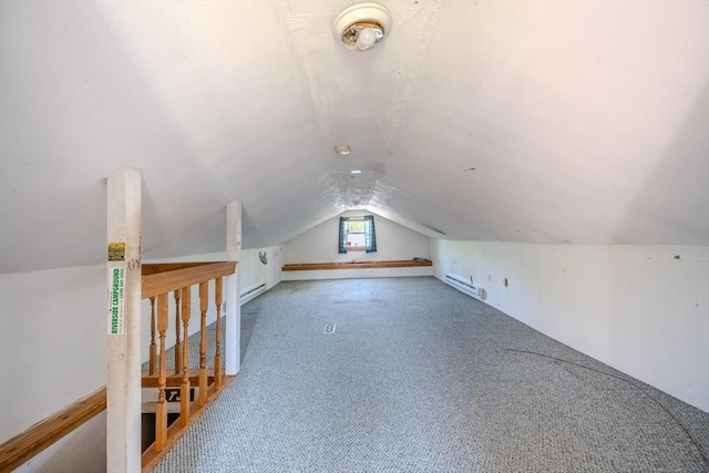 12 Jensen Ave, Chelmsford, MA 01824 - additional living space with a baseboard heating unit, carpet, and vaulted ceiling