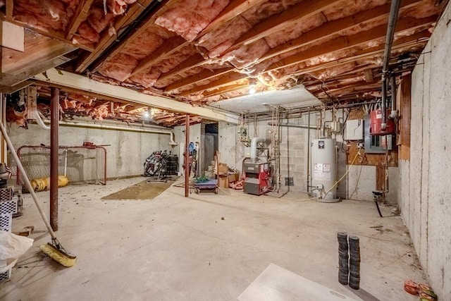 12 Jensen Ave, Chelmsford, MA 01824 - unfinished basement featuring gas water heater and a heating unit