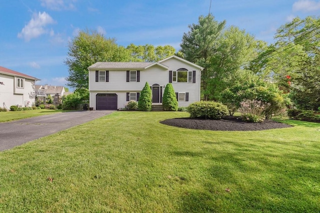 998 Wood, Swansea, MA 02777 - split foyer home with asphalt driveway, an attached garage, and a front lawn