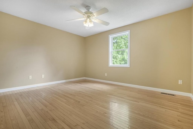 998 Wood, Swansea, MA 02777 - unfurnished room featuring baseboards, light wood finished floors, and ceiling fan