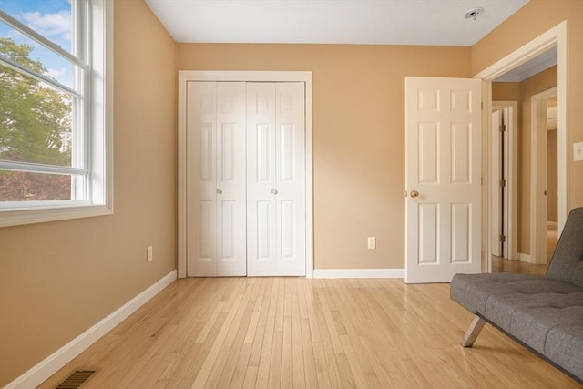 998 Wood, Swansea, MA 02777 - sitting room with light wood-type flooring and baseboards