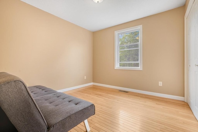 998 Wood, Swansea, MA 02777 - living area with baseboards and light wood-style floors