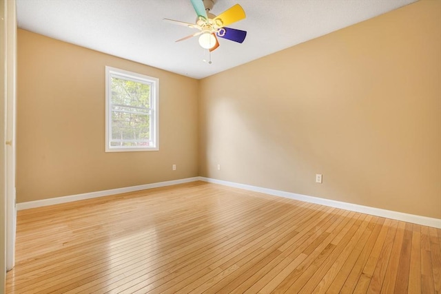 998 Wood, Swansea, MA 02777 - empty room featuring light wood-type flooring, a ceiling fan, and baseboards