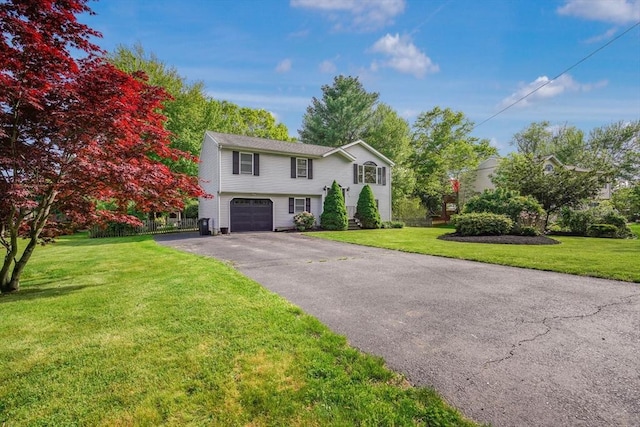 998 Wood, Swansea, MA 02777 - split foyer home with driveway, a garage, and a front yard