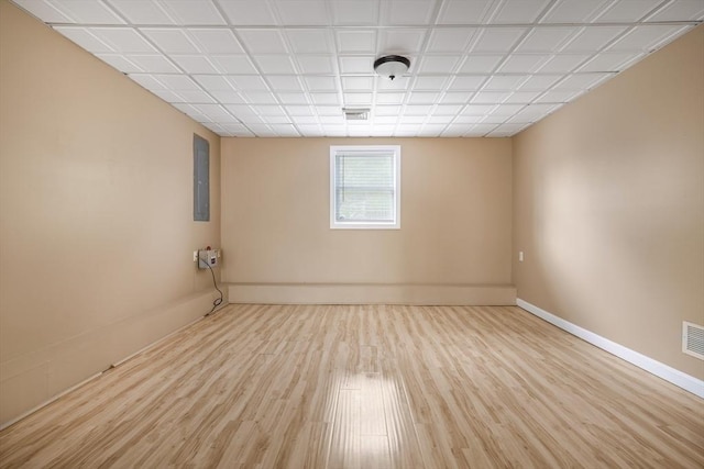 998 Wood, Swansea, MA 02777 - empty room with wood finished floors, electric panel, and baseboards