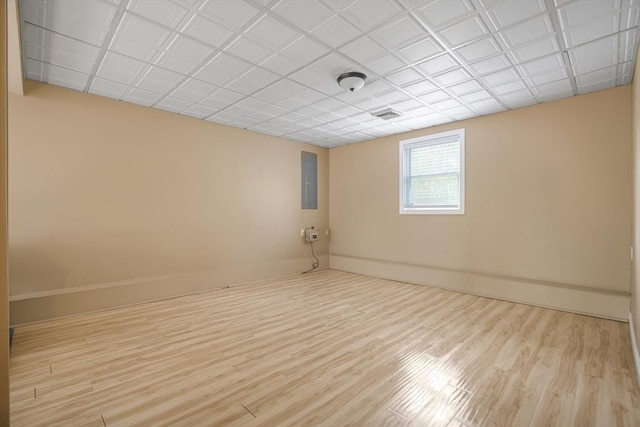 998 Wood, Swansea, MA 02777 - spare room with baseboards, wood finished floors, and electric panel