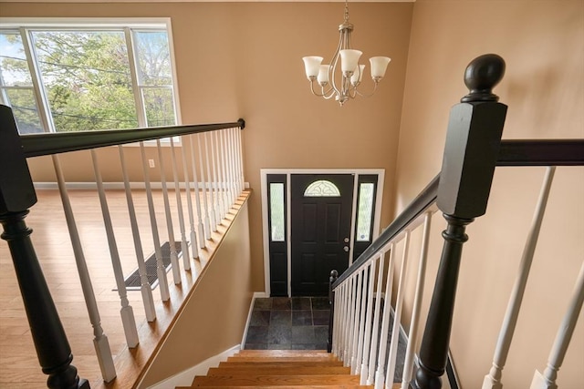 998 Wood, Swansea, MA 02777 - stairs with baseboards, a chandelier, and wood finished floors