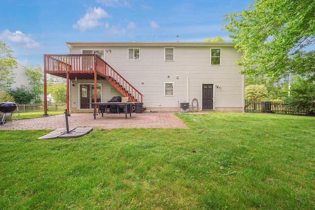 998 Wood, Swansea, MA 02777 - rear view of house featuring a wooden deck, a patio area, central AC, and stairway