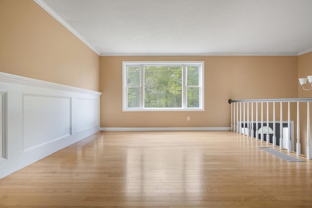 998 Wood, Swansea, MA 02777 - spare room featuring wood-type flooring and ornamental molding